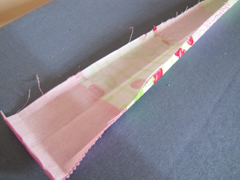 Ironing edges of fabric belt