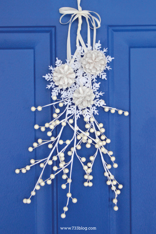DIY Wintry Snowflake and Pine Cone Door Hanging